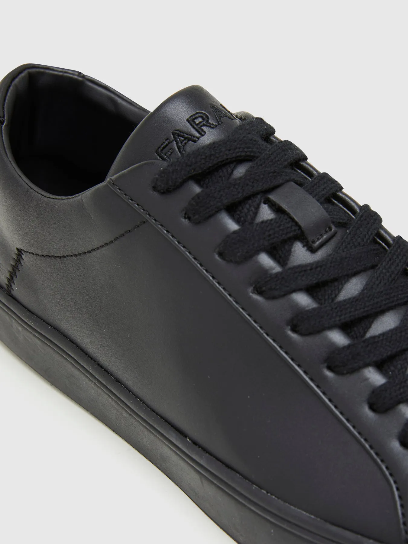 Rigby Cupsole Leather Trainer In Jet Black